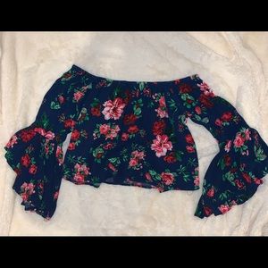 Super cute flowered bell bottom sleeve crop top!
